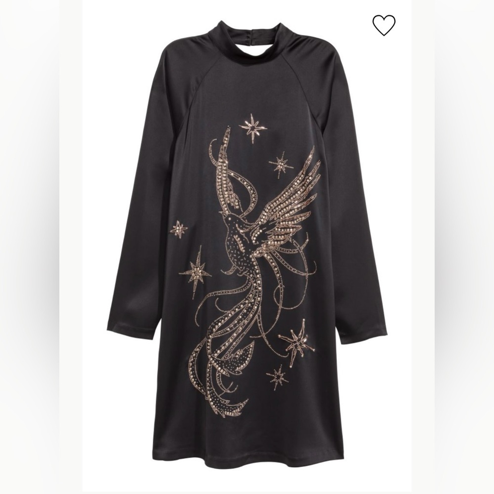 Knee-length, straight-cut dress in satin with beaded embroidery and rhinestones.